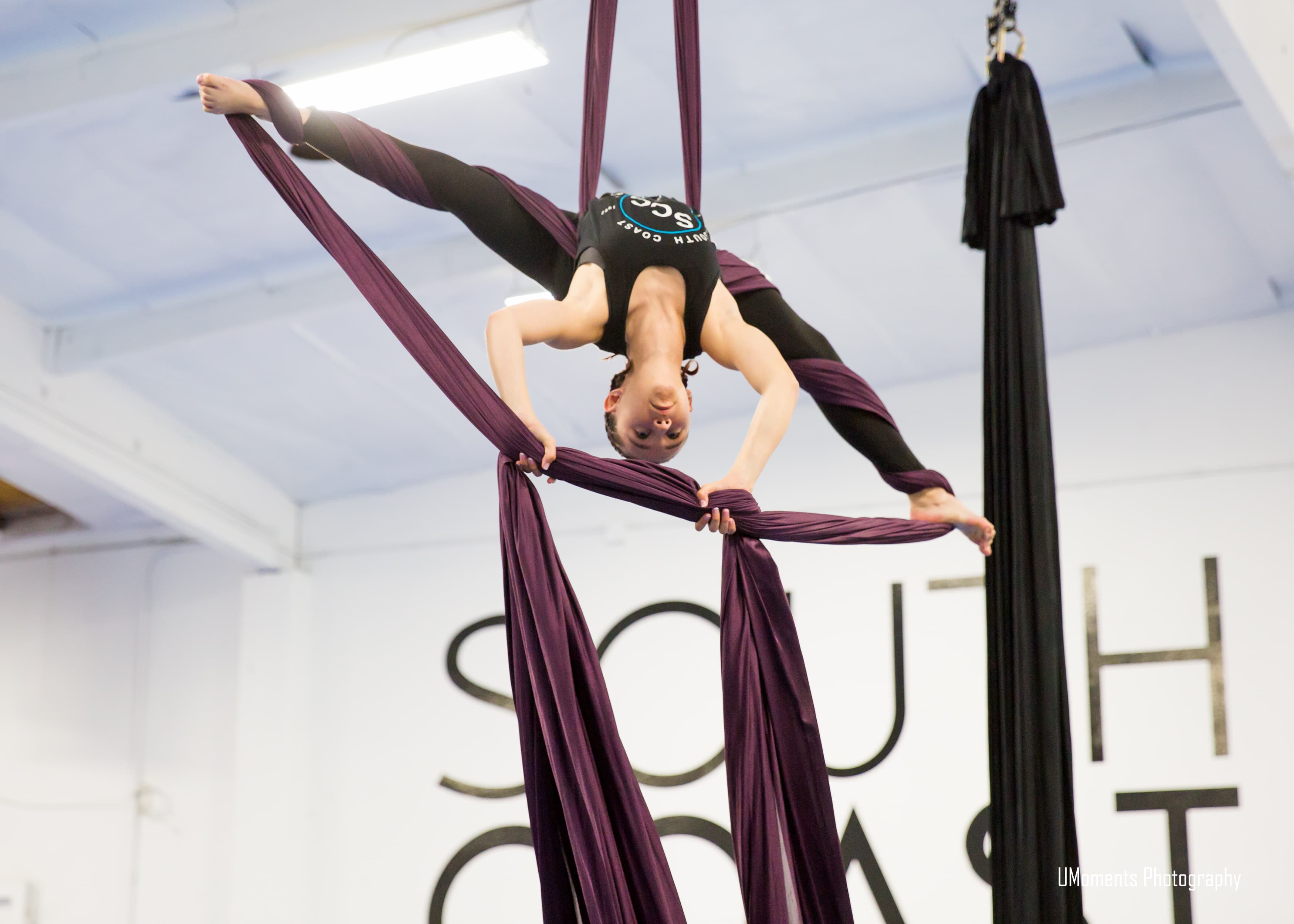 Aerial dance students in silks